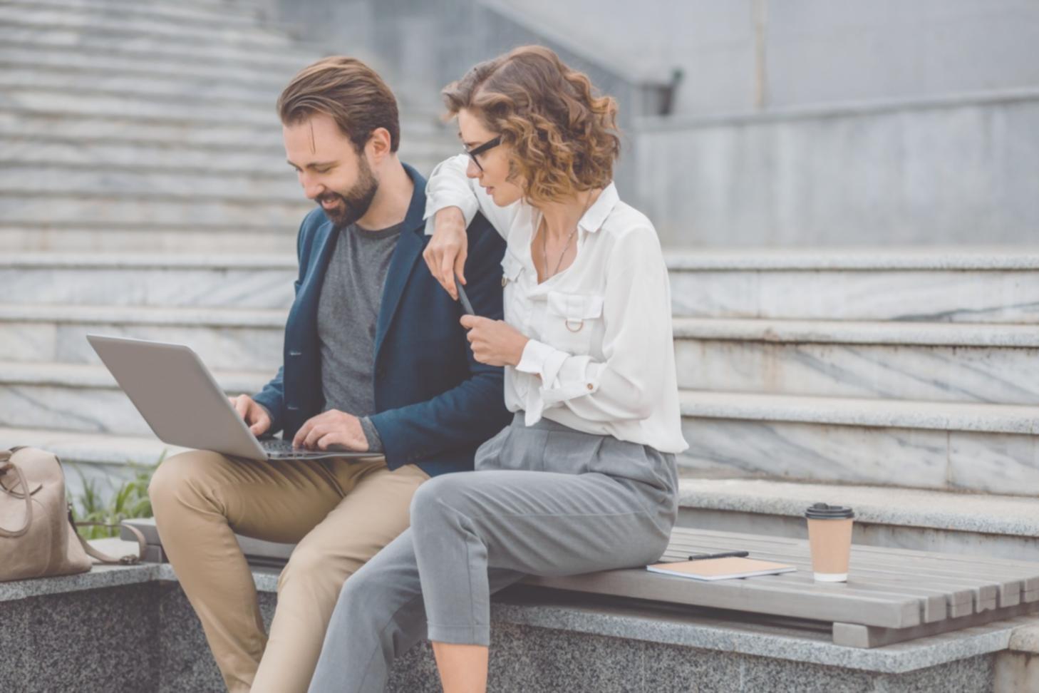 Startup founders collaborating in modern workspace